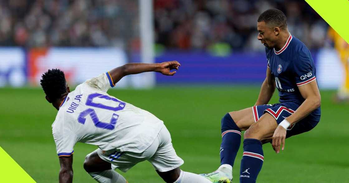 Vinicius Jr and Kylian Mbappe during a UCL clash