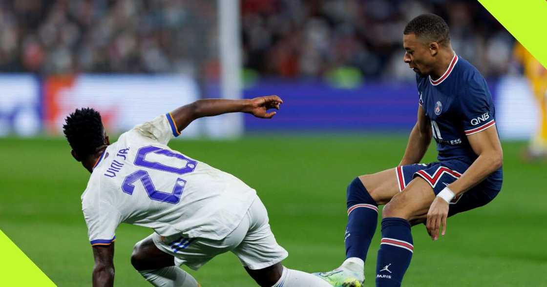 Vinicius Jr and Kylian Mbappe during a UCL clash Vinicius Jr and Kylian Mbappe during a UCL clash