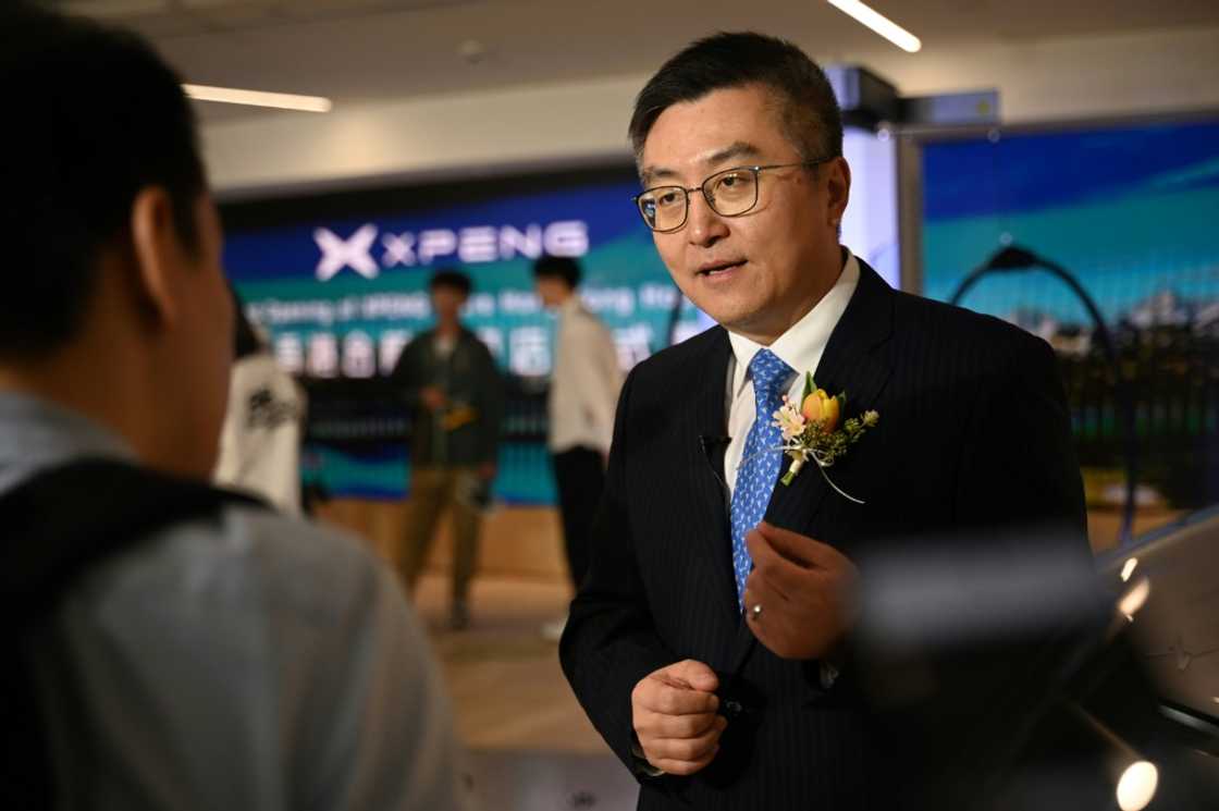Brian Gu, co-president of Chinese EV maker XPeng Inc., speaks to AFP at the opening of their second flagship store in Hong Kong Brian Gu, co-president of Chinese EV maker XPeng Inc., speaks to AFP at the opening of their second flagship store in Hong Kong