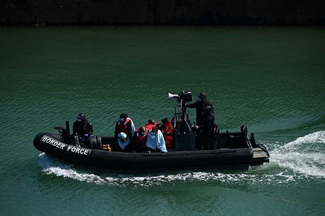 Government figures showed that 990 migrants crossed the Channel in small boats on Saturday Government figures showed that 990 migrants crossed the Channel in small boats on Saturday