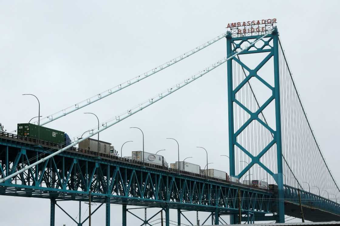 Trucks cross the Ambassador Bridge connecting Windsor, Canada and Detroit, Michigan on April 2, 2025 Trucks cross the Ambassador Bridge connecting Windsor, Canada and Detroit, Michigan on April 2, 2025