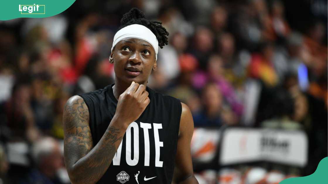 Indiana Fever guard Erica Wheeler looks on during halftime of game