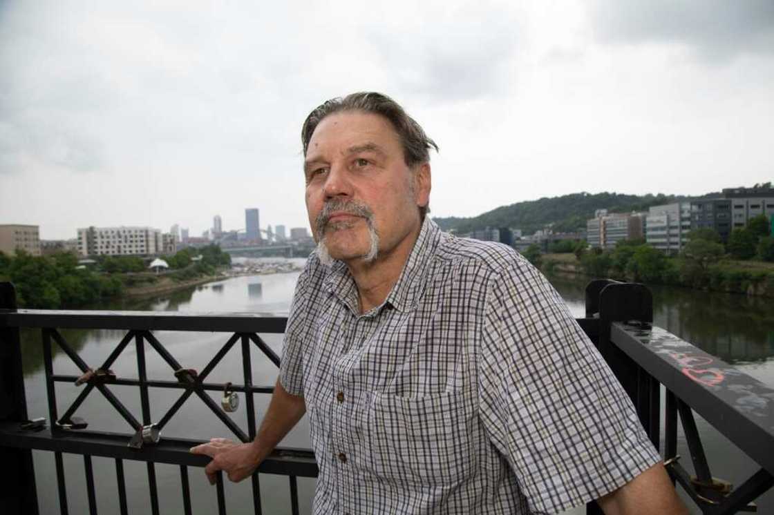 Edward Stankowski, Jr., a former steelworker, stands on the Hot Metal Bridge  above the Monongahela River, a waterway once teeming with iron ore and coal barges for Pittsburgh steel mills Edward Stankowski, Jr., a former steelworker, stands on the Hot Metal Bridge  above the Monongahela River, a waterway once teeming with iron ore and coal barges for Pittsburgh steel mills
