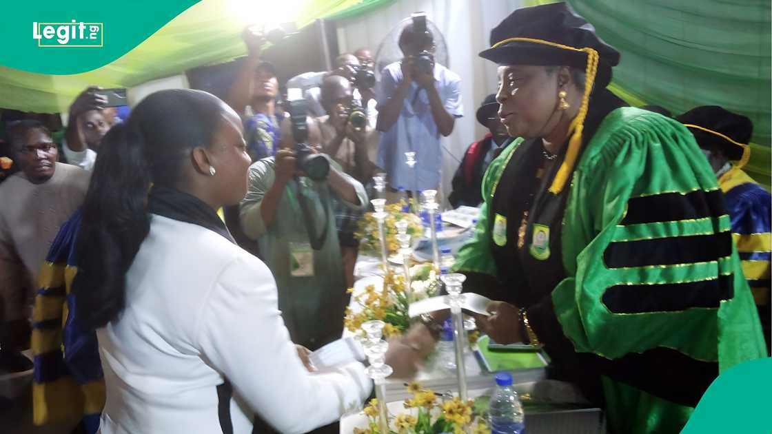 Dr. Chioma Njelita receiving best graduand award at COOUCOM 2025 induction ceremony Dr. Chioma Njelita receiving best graduand award at COOUCOM 2025 induction ceremony