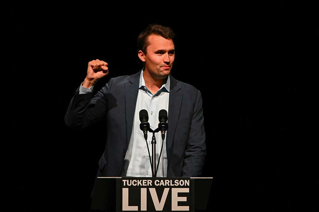 Charlie Kirk speaks on stage