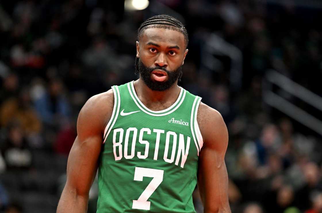 Jaylen Brown walks during a basketball game in Washington, DC.