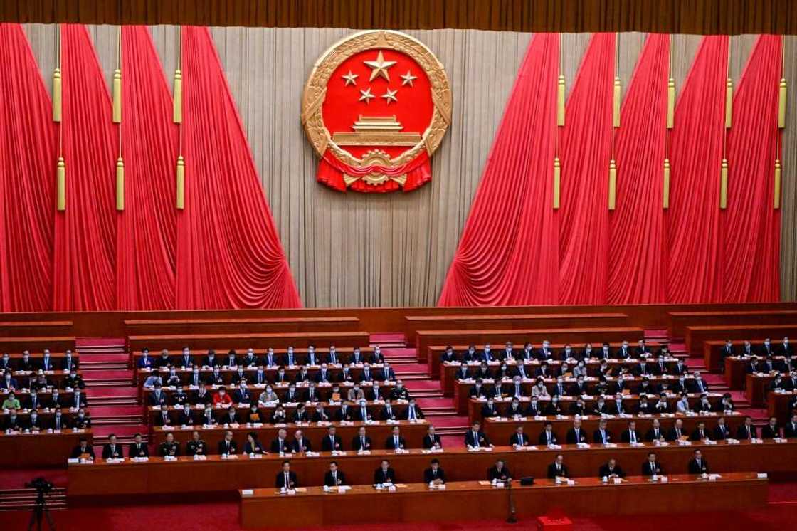 China's rubber-stamp national legislature meets to appoint the country's new cabinet China's rubber-stamp national legislature meets to appoint the country's new cabinet