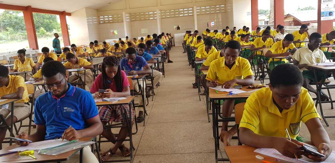 Students in an exam room sitting for WASSCE in 2019