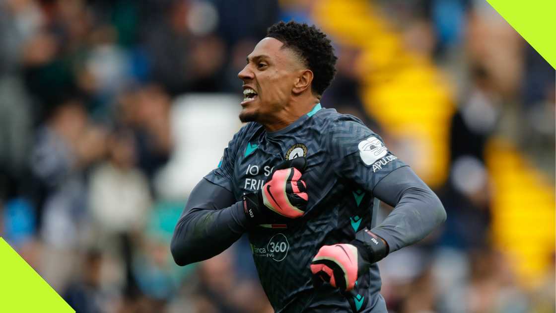 Udinese's Maduka Okoye celebrates at the end of the Serie A match Udinese's Maduka Okoye celebrates at the end of the Serie A match