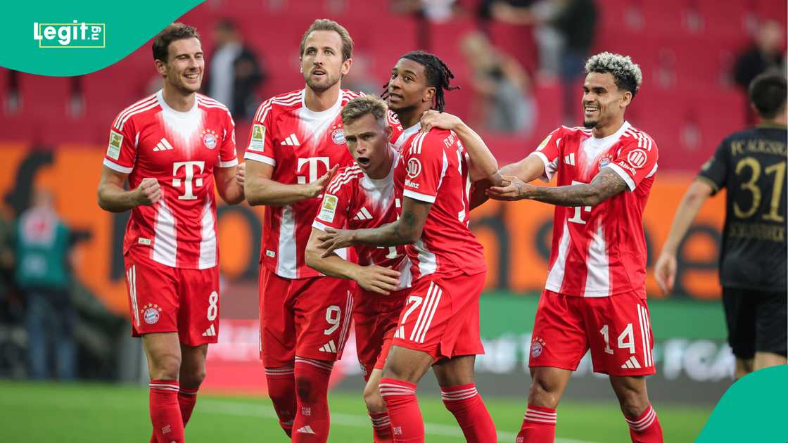 Bayern Munich players celebrate against Augsburg. Photo by Christiana Pahnke