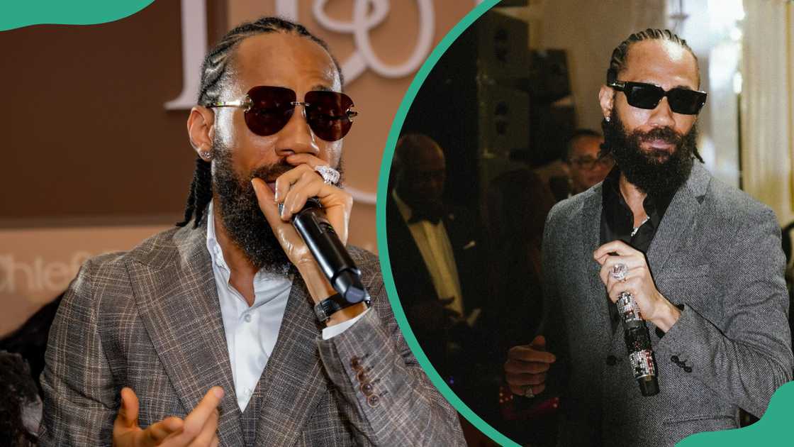 Phyno is seen performing in suits