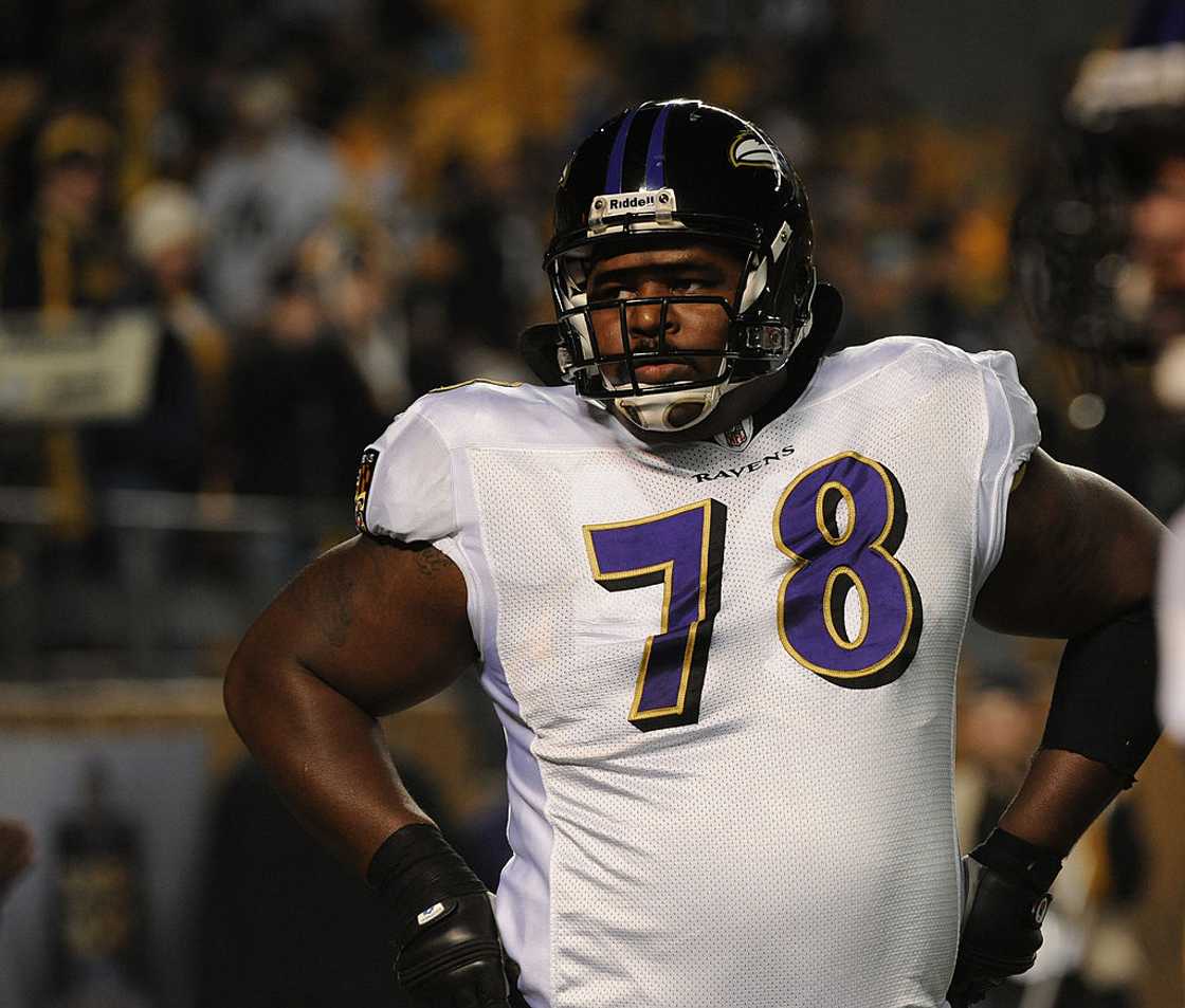 Bryant McKinnie looks on from the sideline during a game against the Pittsburgh Steelers