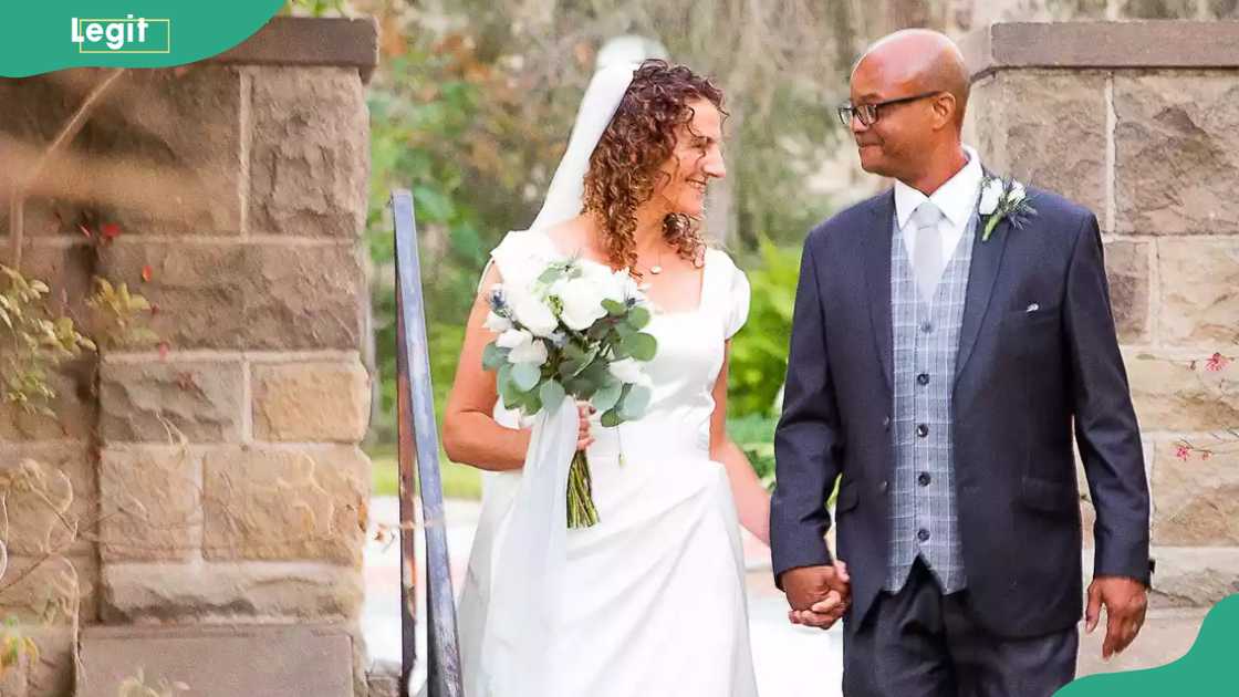 Todd Bridges and Bettijo B. Hirschi hold hands on their wedding day Todd Bridges and Bettijo B. Hirschi hold hands on their wedding day