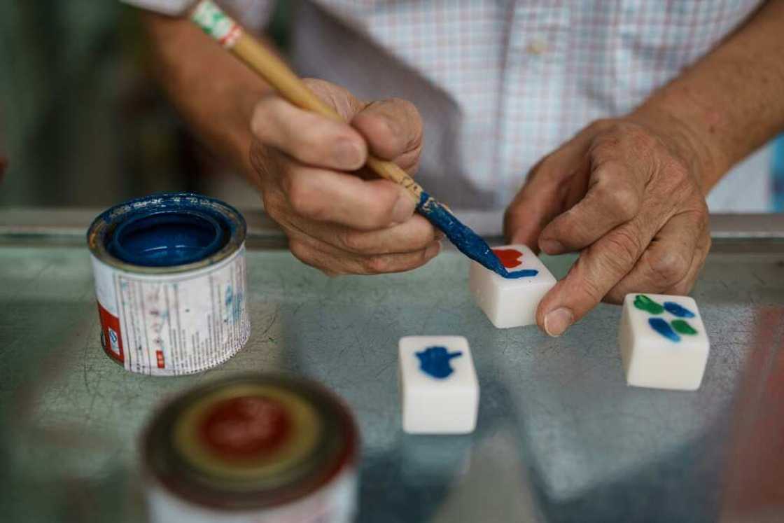 Cheung Shun-king, 70, fears the sense of nostalgia driving purchases of his handmade mahjong tiles will ultimately fade away