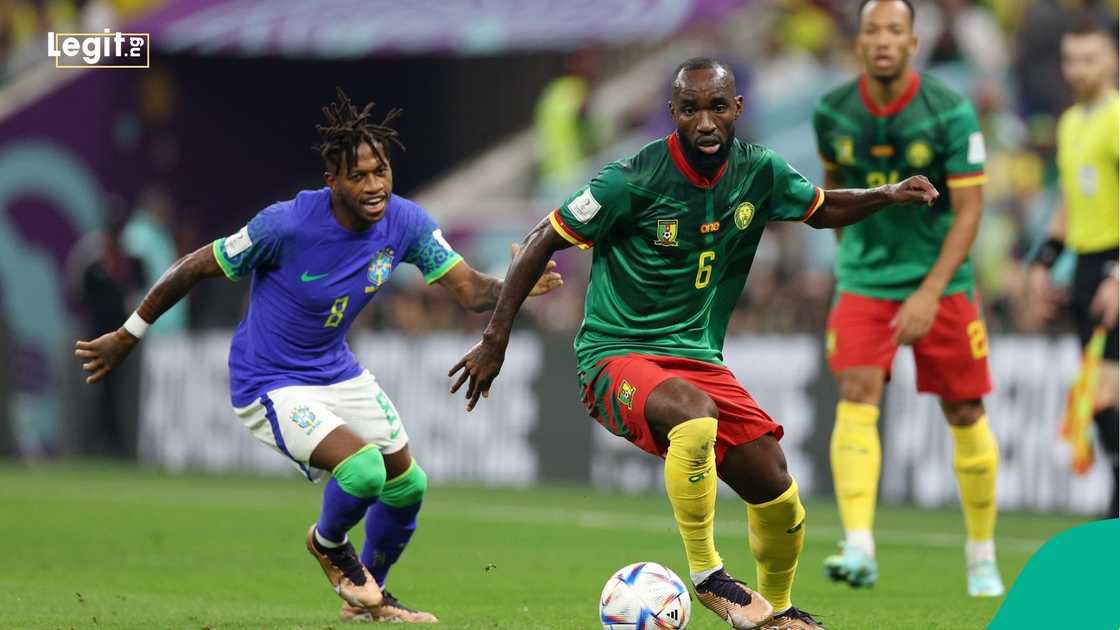 Nicolas Moumi Ngamaleu, Fred, 2022 FIFA World Cup, Cameroon, Brazil, Lusail Stadium, Qatar. Nicolas Moumi Ngamaleu, Fred, 2022 FIFA World Cup, Cameroon, Brazil, Lusail Stadium, Qatar.