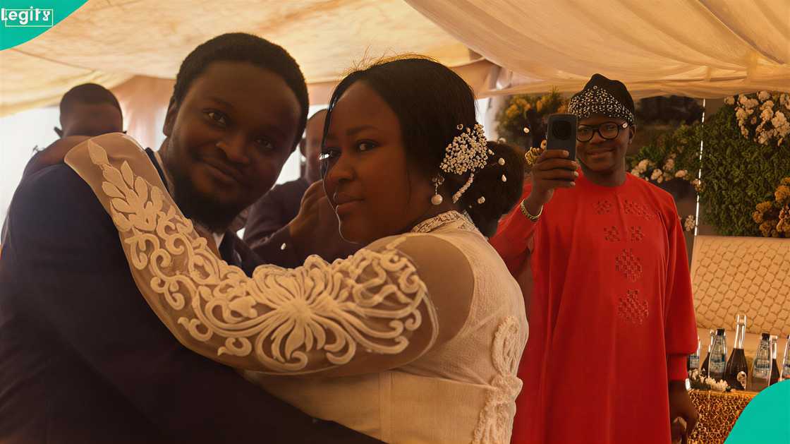 A lady celebrates as her single mum weds after 20 years, sends message to husband