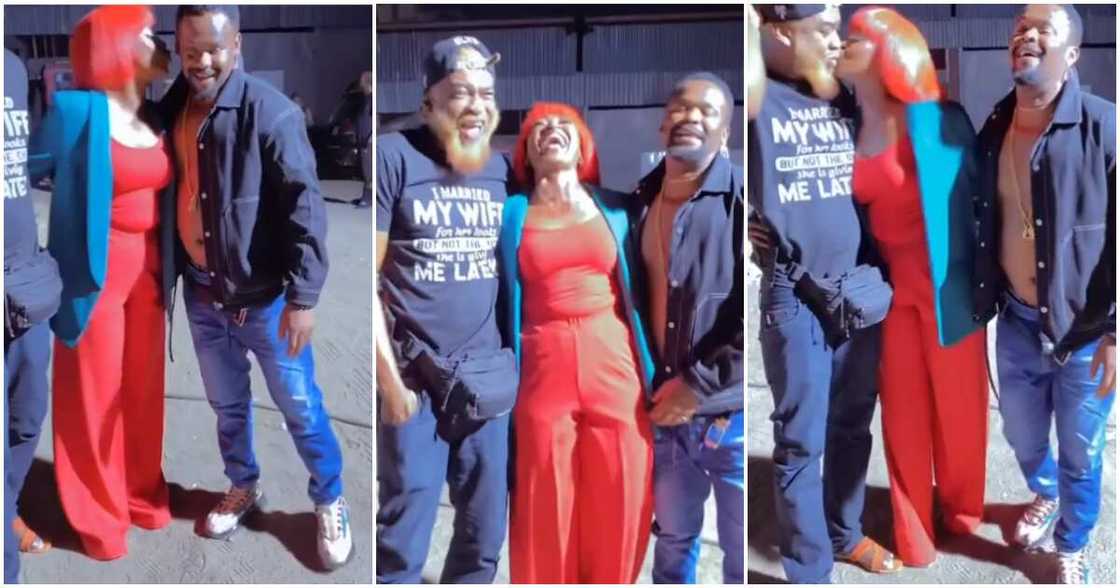 Kate Henshaw kisses Zubby Michael and Chidi Mokeme. Kate Henshaw kisses Zubby Michael and Chidi Mokeme.