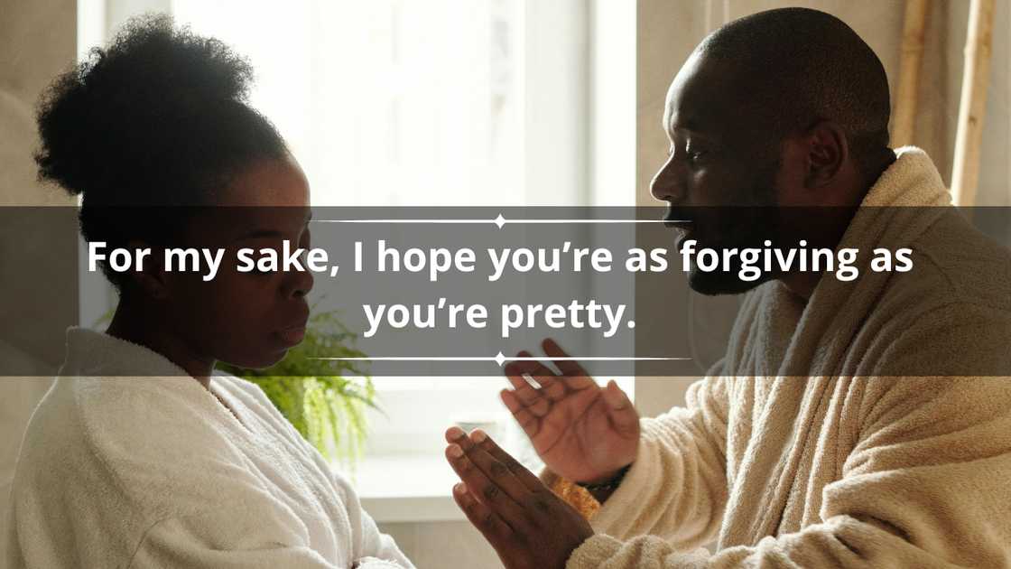 A couple in matching bath robes arguing indoors