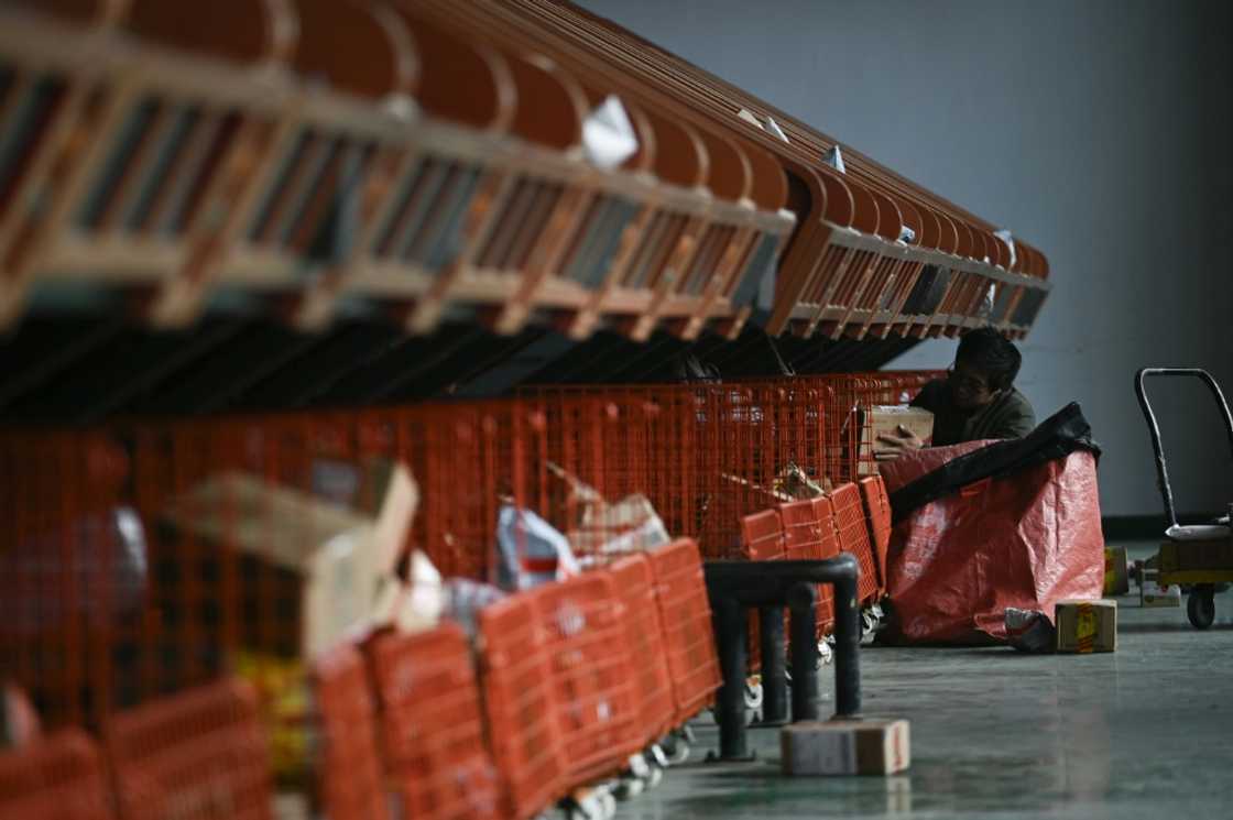 Shares in ecommerce firms fell in Hong Kong after the US Postal Service suspended inbound parcels from the city and China