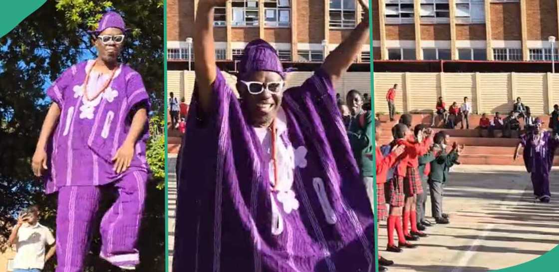 Nigerian teacher in South Africa storms school in native attire. Nigerian teacher in South Africa storms school in native attire.