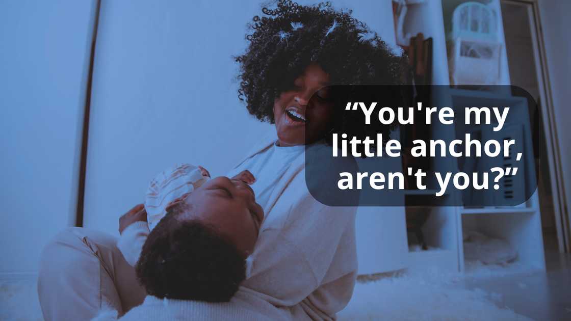 A woman rocking her son to sleep