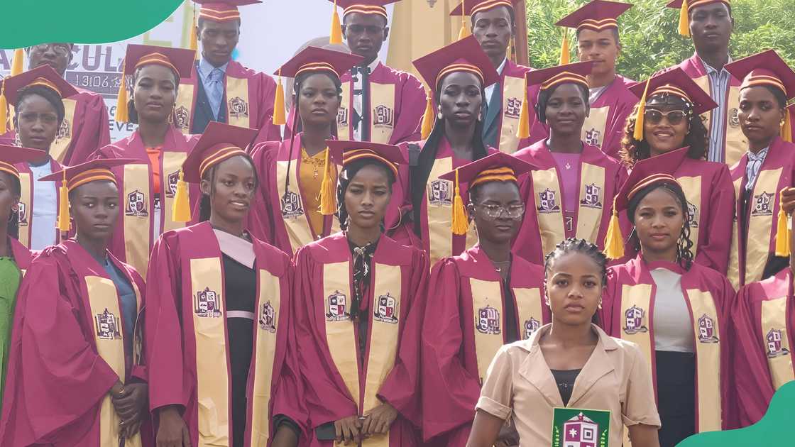 Hillside University students in red graduation gowns. Hillside University students in red graduation gowns.