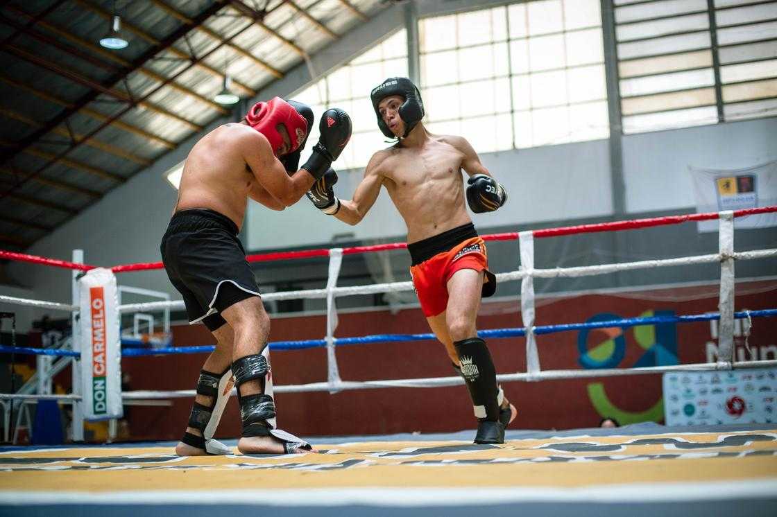 Men training MMA at the gym Men training MMA at the gym