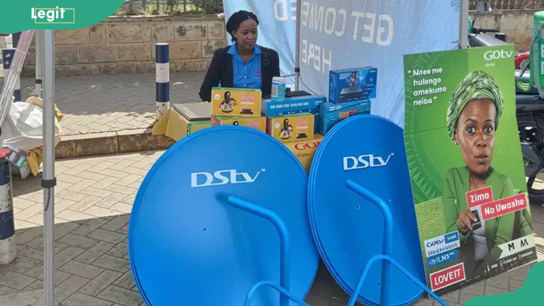 A lady selling DStv products A lady selling DStv products