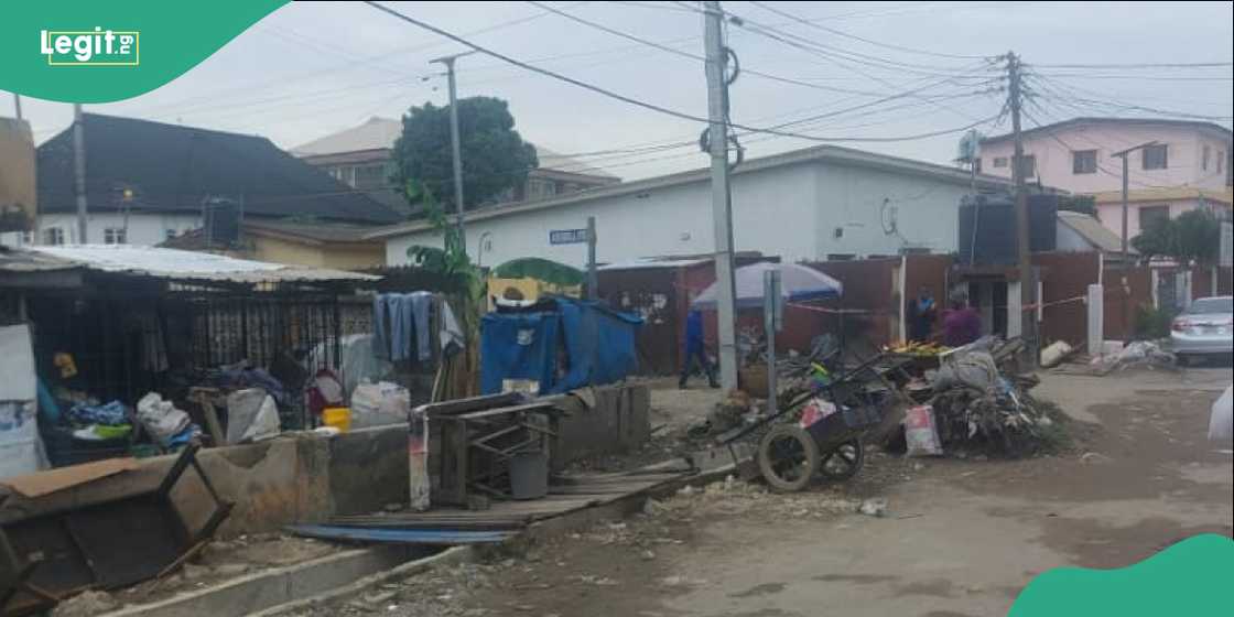 An unfinished drainage channel stretches through a busy neighbourhood in Surulere.