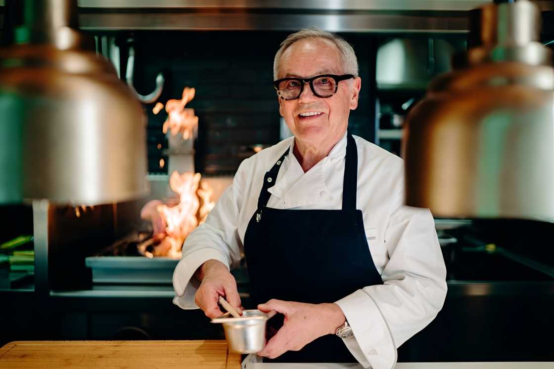 Wolfgang Puck poses in a kitchen setting Wolfgang Puck poses in a kitchen setting