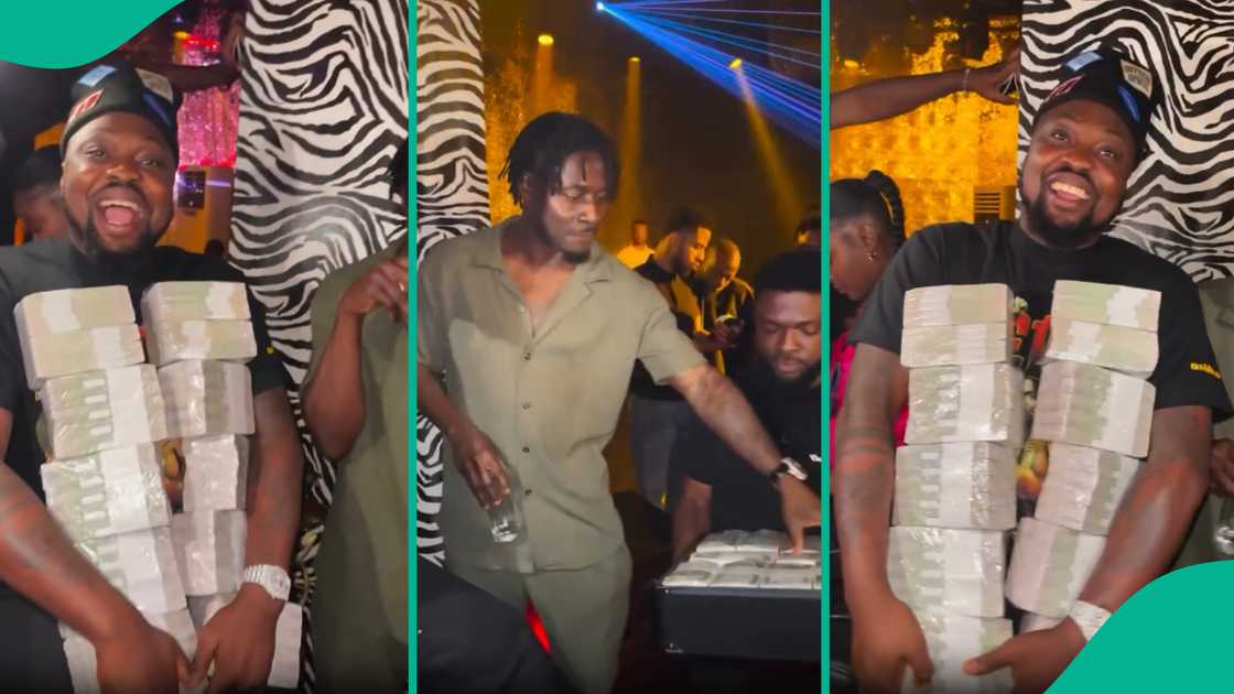 Obafemi Martins gives Egungun 10 stacks of money in nightclub.