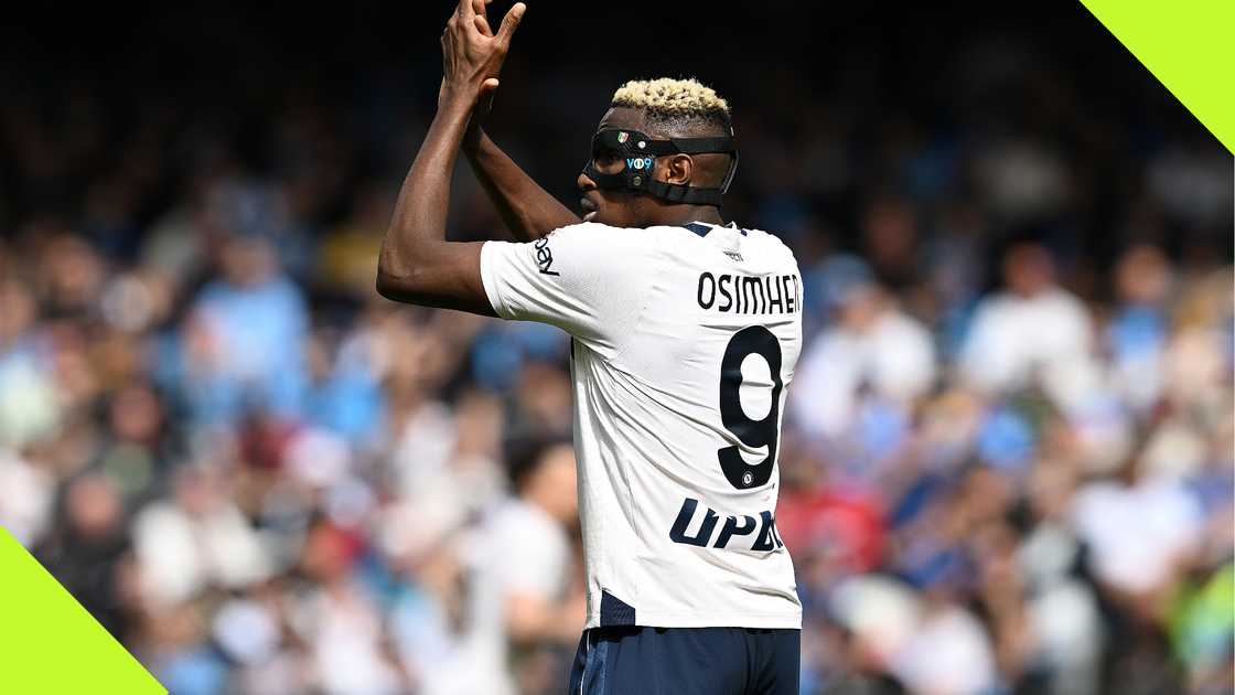 Victor Osimhen applauds Napoli fans.