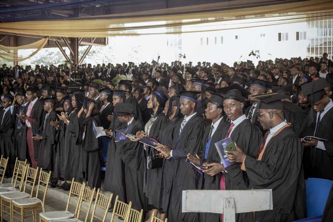 Newly matriculated students of Babcock University stand up to take the took their oath to uphold the Babcock University's core values Newly matriculated students of Babcock University stand up to take the took their oath to uphold the Babcock University's core values