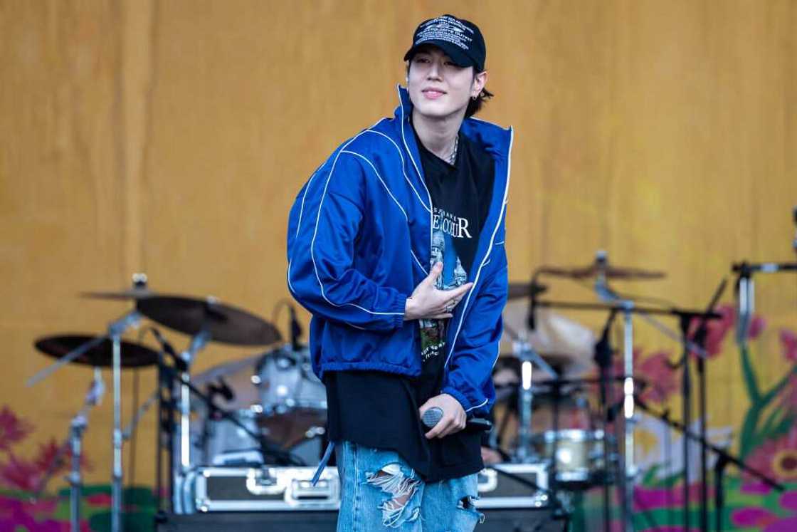 YUGYEOM performs onstage during the 2022 Bluespring Festival. YUGYEOM performs onstage during the 2022 Bluespring Festival.