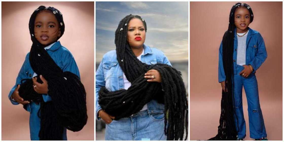 Toyin Lawani and little gir. Toyin Lawani and little gir.