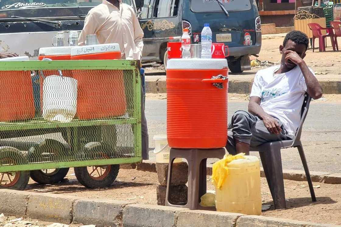 Business is slow for this street vendor in the Sudanese capital Khartoum, one of the main battlegrounds of the conflict Business is slow for this street vendor in the Sudanese capital Khartoum, one of the main battlegrounds of the conflict