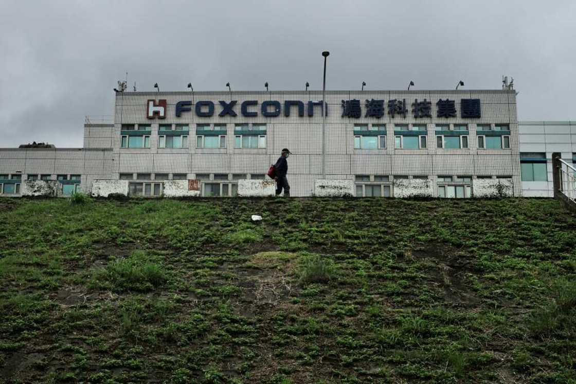 Taiwan defended tech giant Foxconn after China launched an investigation into several of the firm's sites Taiwan defended tech giant Foxconn after China launched an investigation into several of the firm's sites