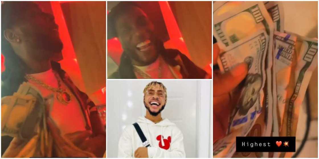 Burna Boy Gifts Poco Lee $100 bills.