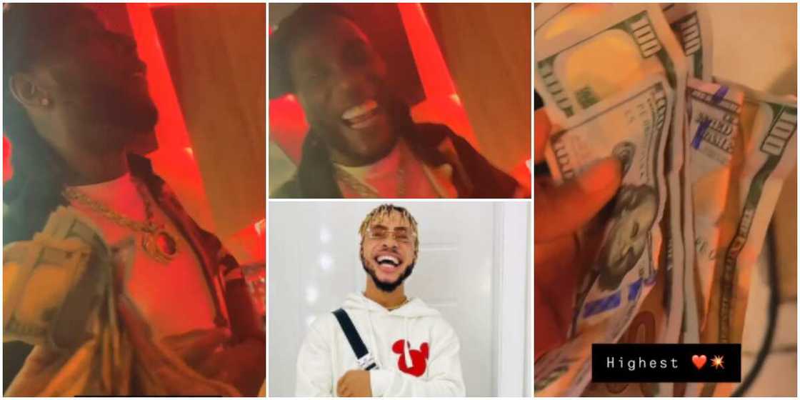 Burna Boy Gifts Poco Lee $100 bills. Burna Boy Gifts Poco Lee $100 bills.
