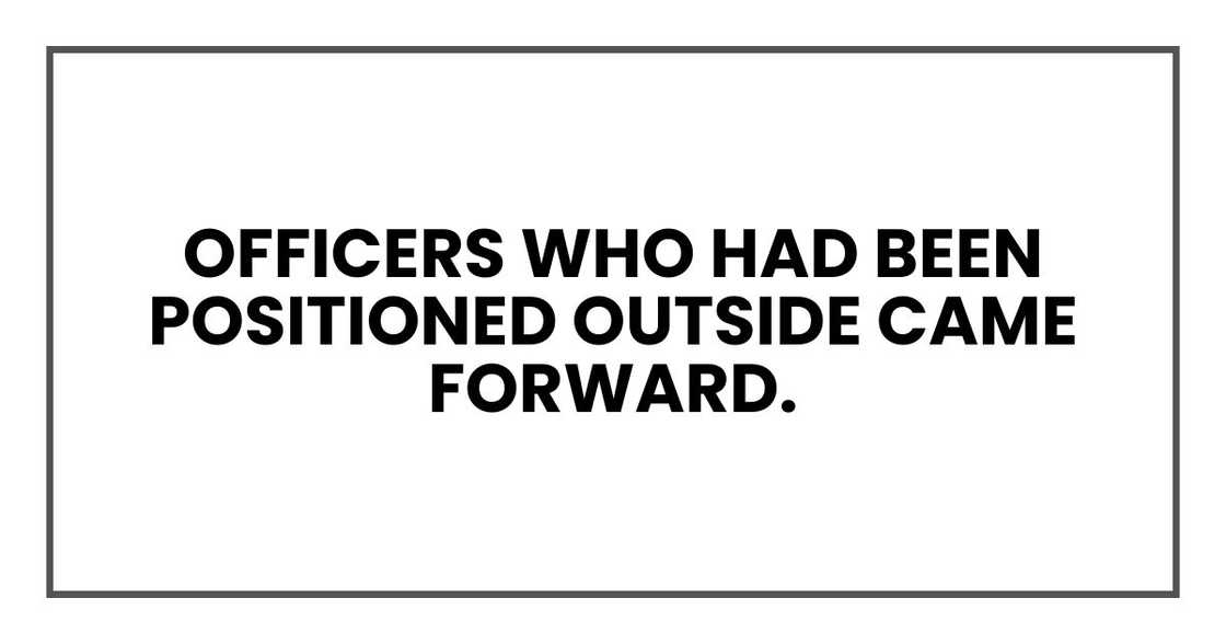 Officers who had been positioned outside came forward.