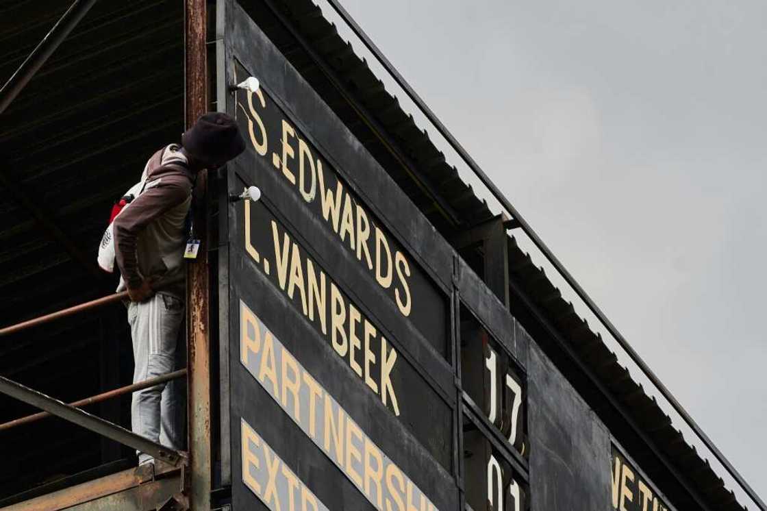 The manually operated scoreboard in Bulawayo is one of the last of its kind in international cricket The manually operated scoreboard in Bulawayo is one of the last of its kind in international cricket