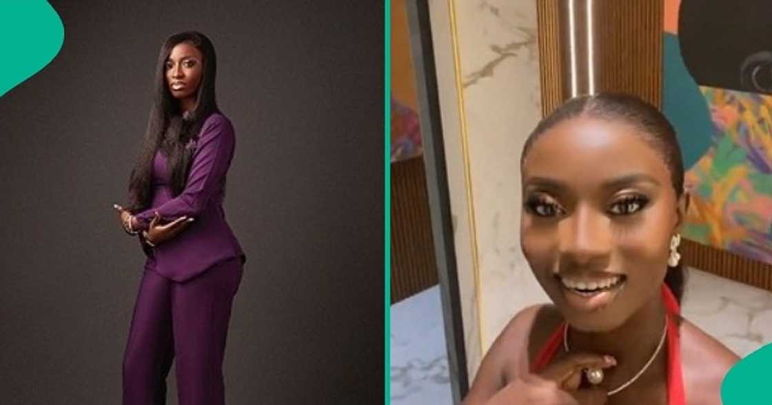 Nigerian lady poses with stranger who wore the same outfit with her. Nigerian lady poses with stranger who wore the same outfit with her.
