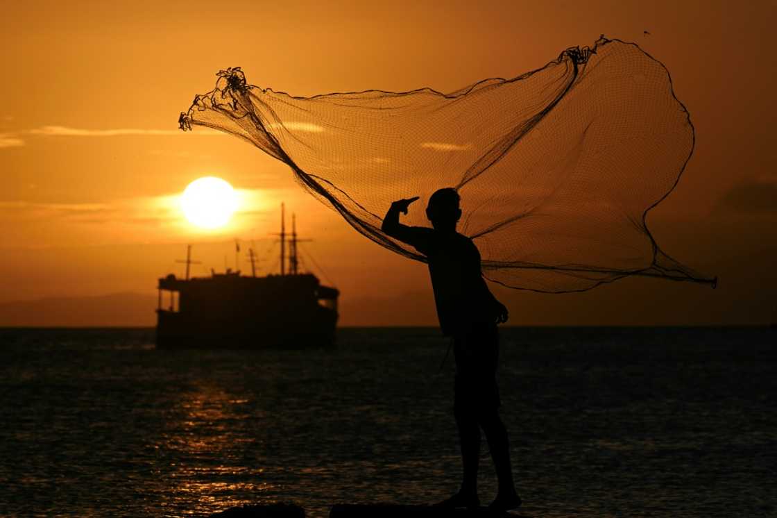 A man fishes at Juan Griego bay in Margarita Island, a Caribbean paradise in decline after a years-long economic and political crisis A man fishes at Juan Griego bay in Margarita Island, a Caribbean paradise in decline after a years-long economic and political crisis