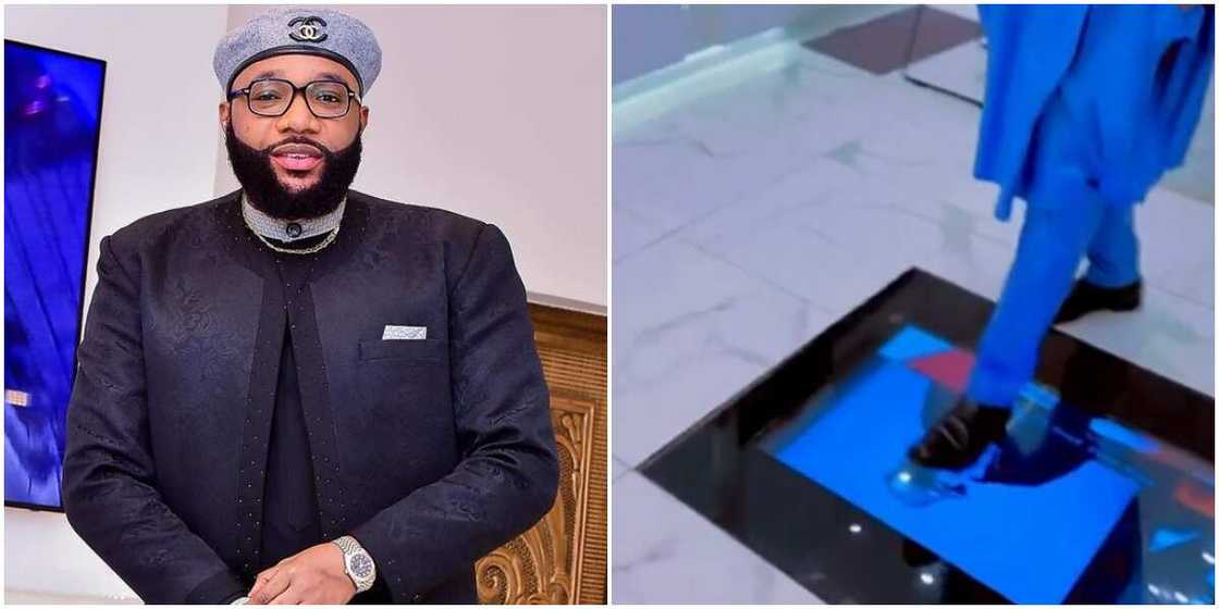 E-Money walks stylishly on top of TV installed inside his kitchen floor E-Money walks stylishly on top of TV installed inside his kitchen floor