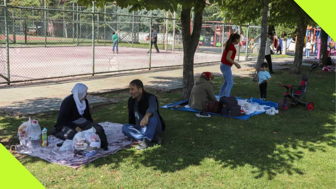 People rest in a public park outdoors away from buildings following an earthquake in Malatya, southern Turkey, Wednesday, Oct. 16, 2024. People rest in a public park outdoors away from buildings following an earthquake in Malatya, southern Turkey, Wednesday, Oct. 16, 2024.