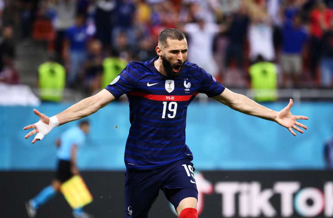 Karim Benzema celebrates after scoring their side's first goal during the UEFA Euro 2020 Championship Karim Benzema celebrates after scoring their side's first goal during the UEFA Euro 2020 Championship