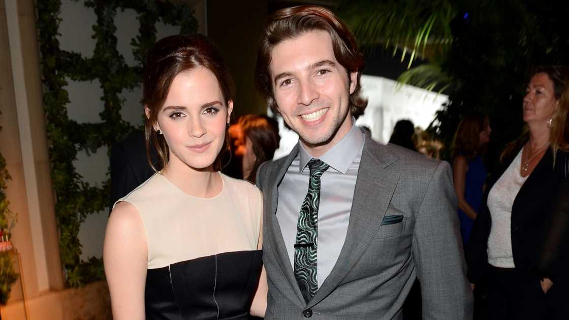 Emma Watson and Roberto Aguire pose together at the 19th Annual Women In Hollywood Celebration for Elle Emma Watson and Roberto Aguire pose together at the 19th Annual Women In Hollywood Celebration for Elle