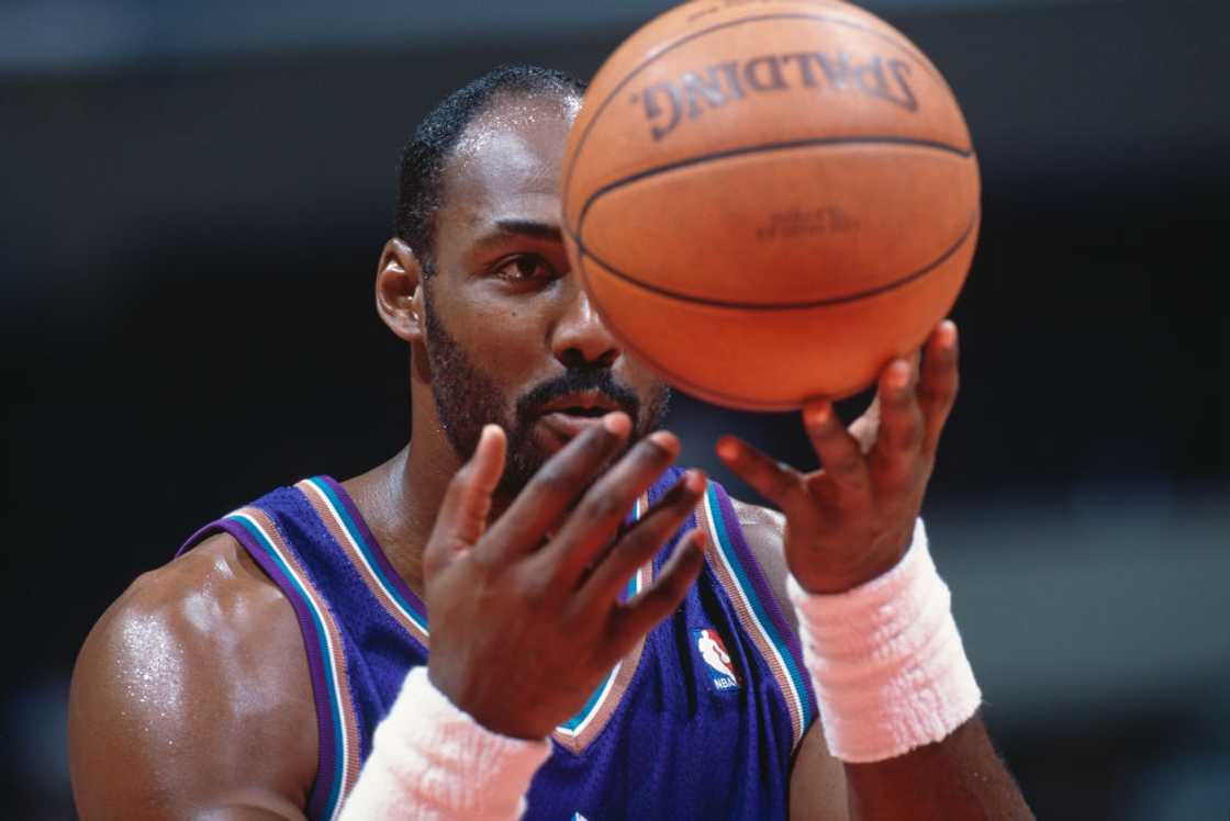 Karl Malone prepares to make a free throw during a match Karl Malone prepares to make a free throw during a match