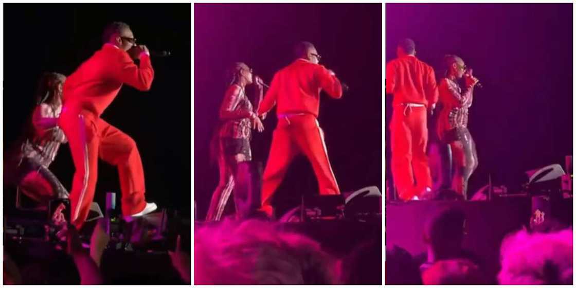 Wizkid and Tems hug perform Essence. Wizkid and Tems hug perform Essence.