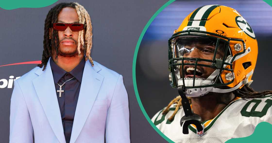 Xavier McKinney poses on the red carpet of the 2023 ESPY Awards ceremony. The Packers safety laughs while wearing the Packers kit.